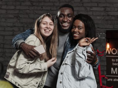 front-view-happy-multicultural-friends