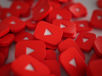 Pile of 3D Play Button Logos